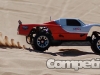 Baja 5T skipping across the sand