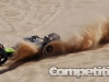 Baja 5B digging out of the sand after a hard landing
