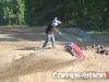 Masked man illegally flipping over cars in the Last Man Standing race
