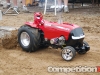 Large-scale tractor making a pass