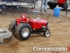Large-scale tractor making a pass