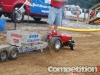 Large-scale tractor making a pass