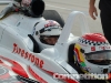 Fred Medel sitting in a two-seater Indy car