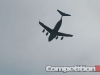 Military bomber flying over the 2010 Long Beach Grand Prix